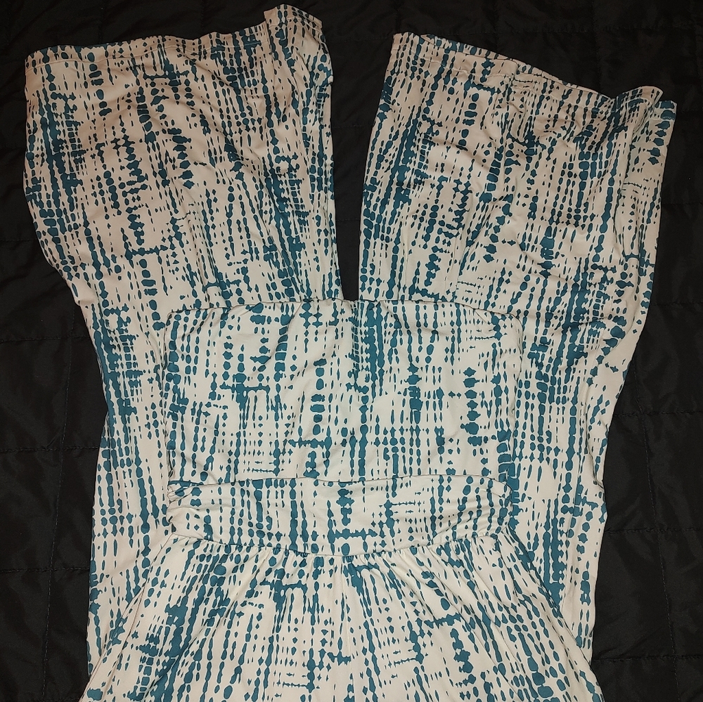 One piece tube top pant set. Cream colored with a sea green or bluish color.